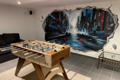 Art Paint a réaliser une fresque murale dans une salle de jeux à Namur