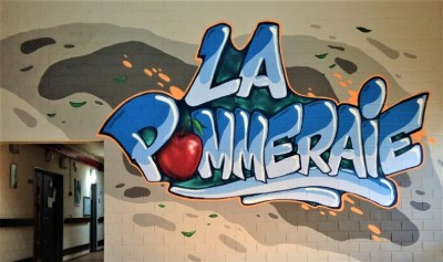 L'expression "La pommeraie" mise en forme dans un graffiti. 