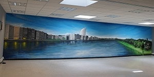 Fresque murale en trompe l’œil pour une agence immobilière à Liège