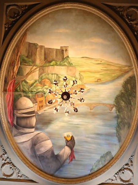 Peinture en trompe l’œil du plafond d’un commerce à Namur