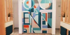Fresque murale graphique dans un cabinet médical à Profondeville