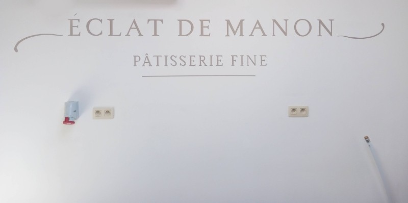 Logo peint à la main pour une pâtisserie à Waremme